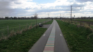 A current cycle path in Cambridge alongside the rail line.