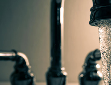 Taps with flowing water.