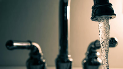 Taps with flowing water.