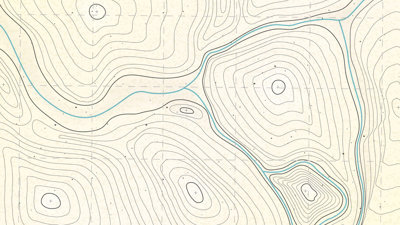 A topographic map with thin lines creating circles and swirls encasing each other around the map.