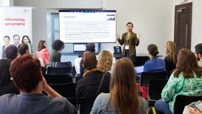 Speaker presenting to group at the Society's Annual Conference