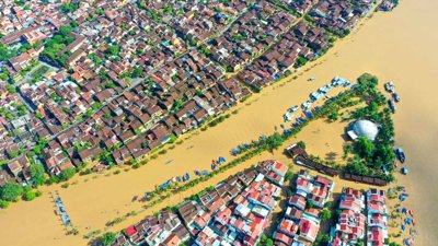 Aerial shot of flooded homes during daytime