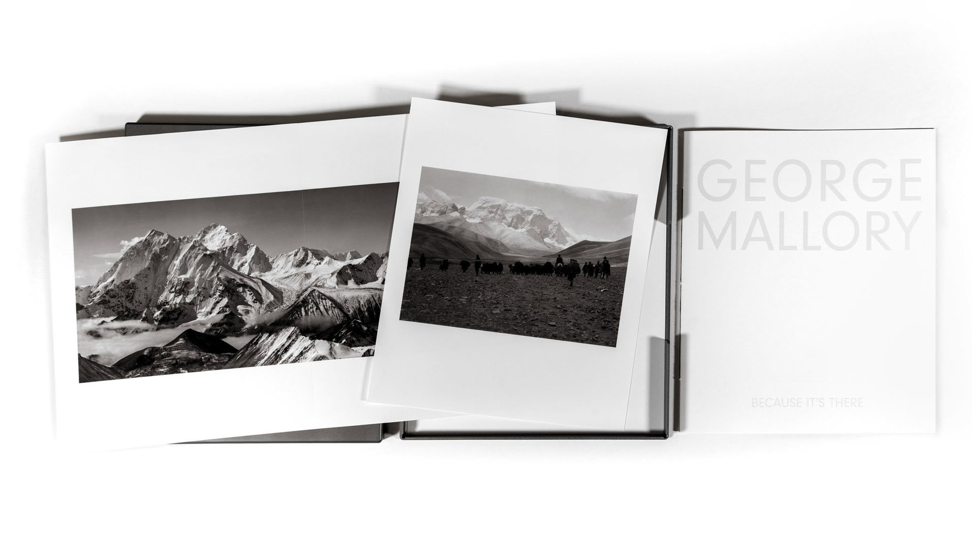 Everest George Mallory platinum print folio displayed with selection of prints.