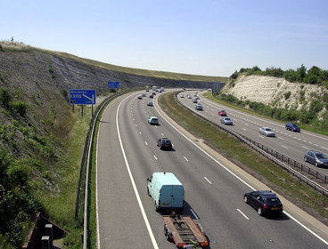 A motorway cutting through the land