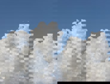 White clouds in a blue sky