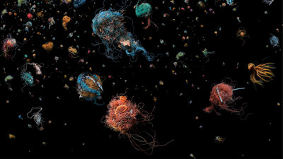 Abstract art of netting clusters against a black background.