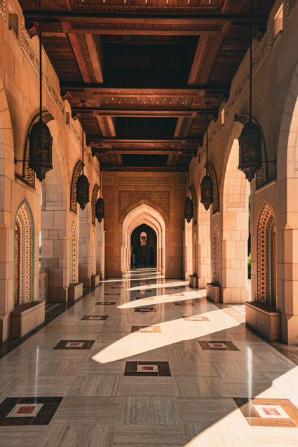 A large hall with Arabic styling and large archways