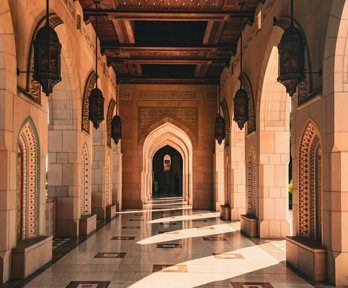 A large hall with Arabic styling and large archways