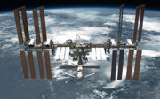 Top view of the International Space Station and Earth as seen from space.