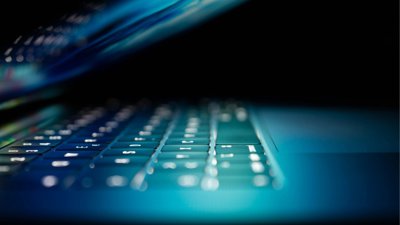 Dark laptop keyboard.