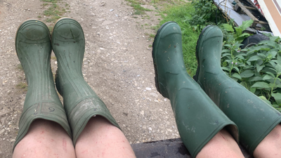Two people wearing wellington boots