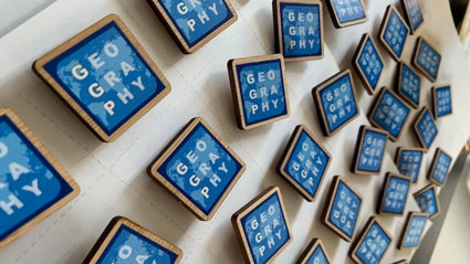 Blue squares reading the word 'geography'. 