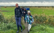 Students and academic on fieldtrip in Norfolk field.