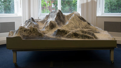 Detailed plaster scale model of Mount Everest.