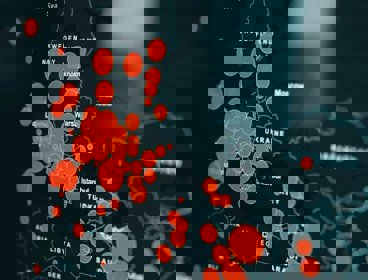 A black map showing Europe and Africa, with red data spots of different sizes located in each country