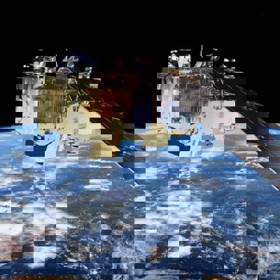 A satellite with Earth in the background, viewed from space