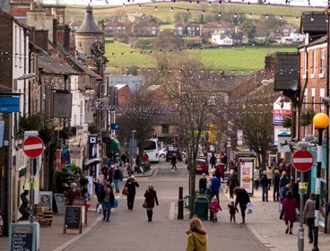 People walking on busy UK highstreet.