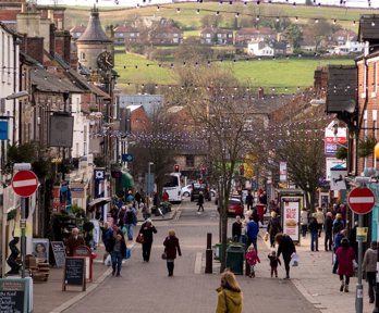People walking on busy UK highstreet.