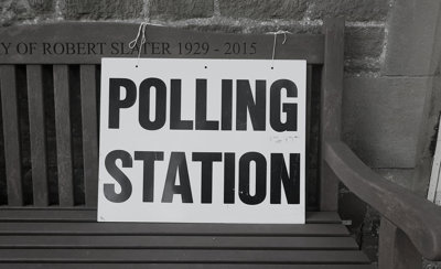 Board reading 'Polling Station'