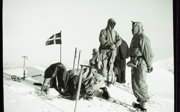 Old photograph of explorers in the snow.