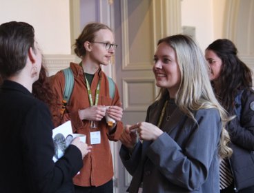 People networking at the royal geographical society.