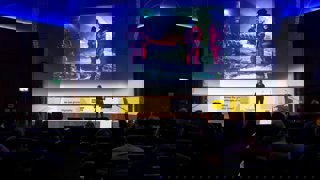 Esther Horvath presenting in Ondaatje Theatre.