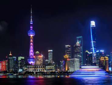 City at night shining bright with neon lights