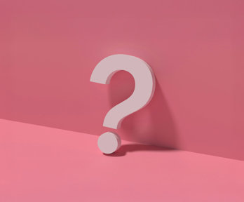 White question mark on a pink background.
