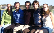 Family of five people posing for a photo.