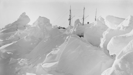 Historical black and white photograph of Endurance in the ice.