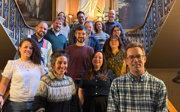 The Latin American Geographies Research Group on their writing retreat, standing on some stairs.
