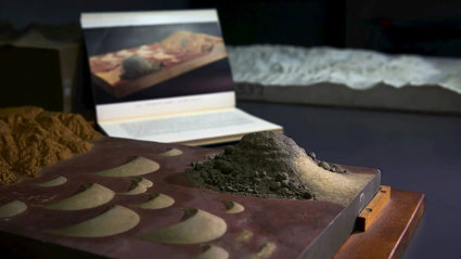 A plaster and wooden model showing a sand dune formation.