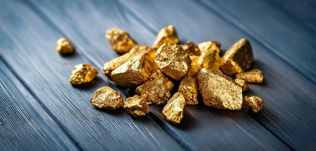 Golden nuggets on blue-grey boards.