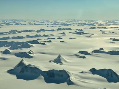 A view over a rocky snow covered expanse of Antarctica