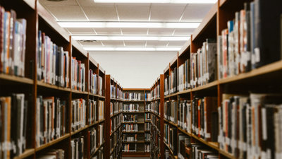 Shelves with books in an archive.