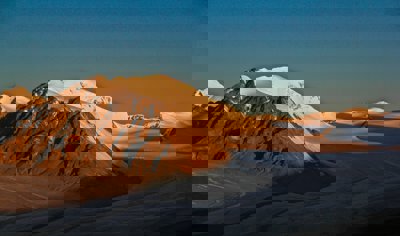 Snow covered mountain with glacier